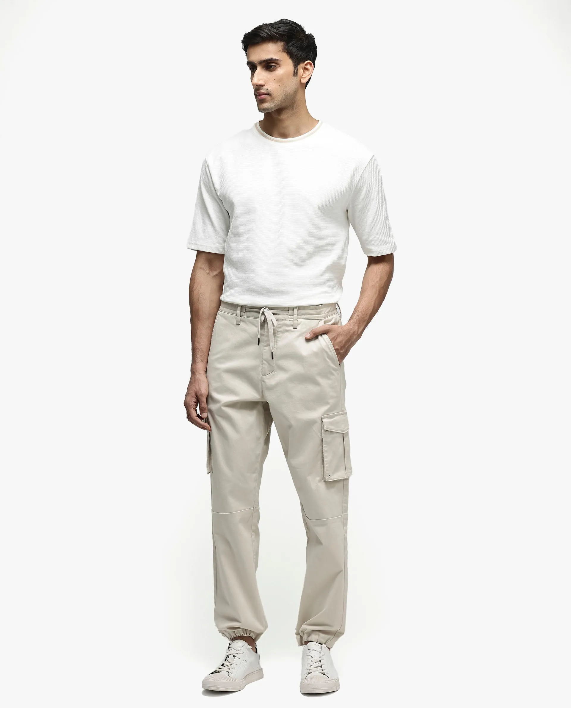 Rare Rabbit Men's Maks Off White Drawstring Closure Mid-Rise Relaxed Fit Solid Trouser