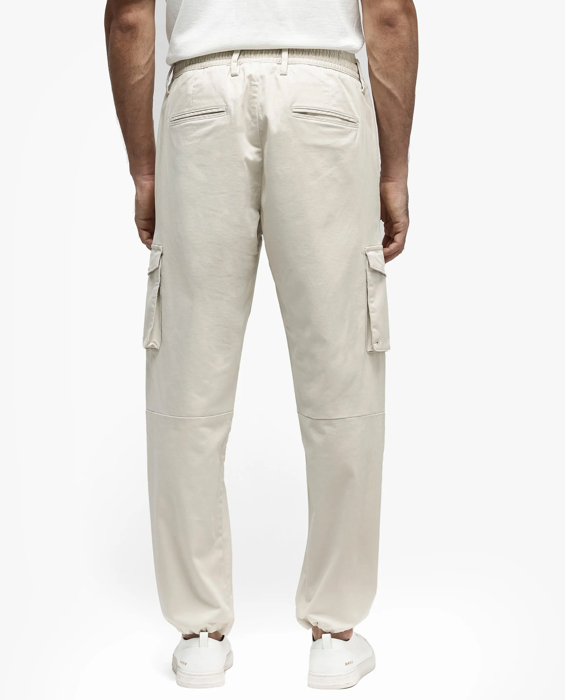 Rare Rabbit Men's Maks Off White Drawstring Closure Mid-Rise Relaxed Fit Solid Trouser