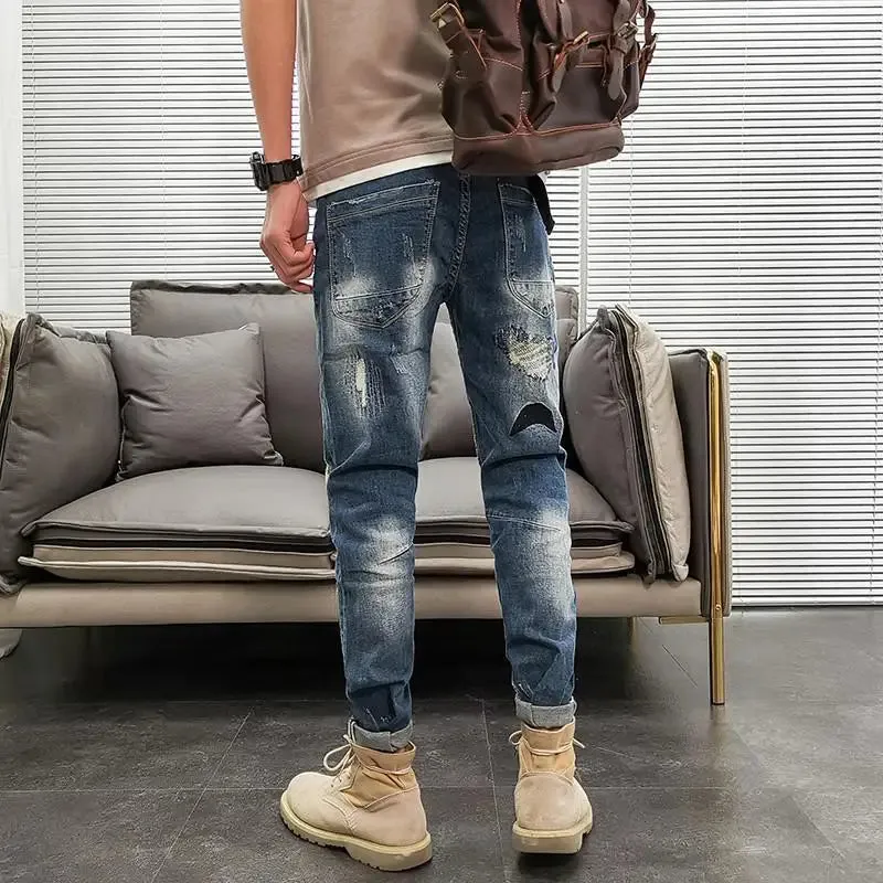 Ripped-Patchwork Slim Fit Jeans